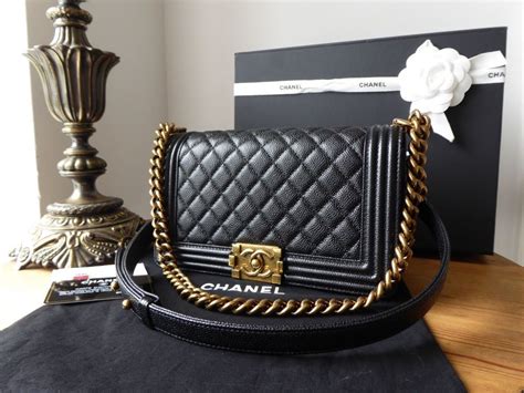 chanel boy caviar black gold|Chanel Boy Bag .